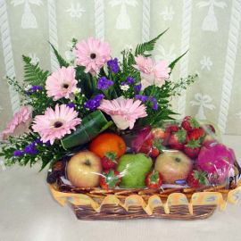 Mixed Fruits and Pink Gerberas Arrangement