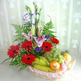 Red Gerbera with Pink Lily and Fruits Basket Arrangement