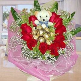 11 Red Roses with 9 Ferrero Roche and Bear Handbouquet