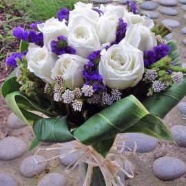 12 White Roses With Cordyline Foliage Hand Bouquet 