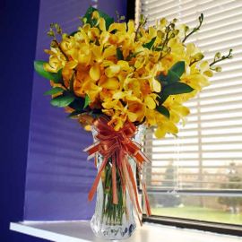 Yellow Mokara Orchids in Glass Vase